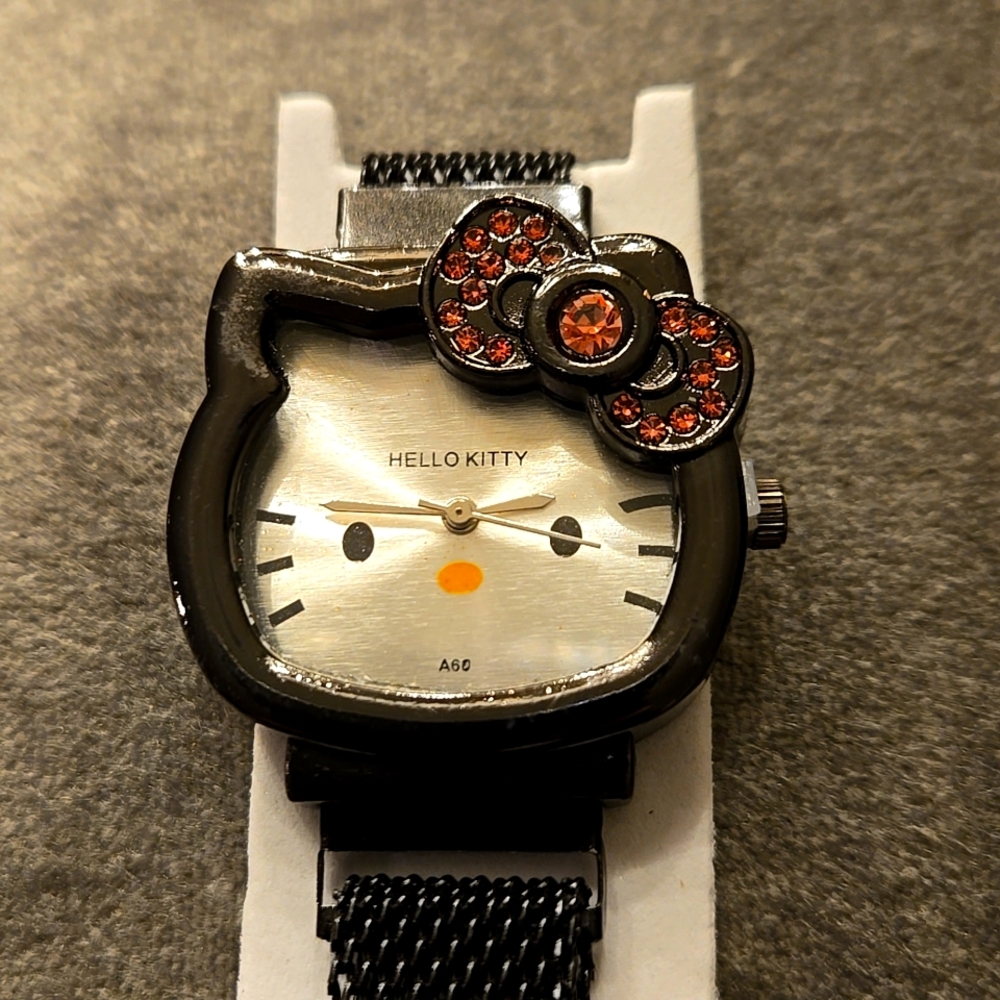 Hello Kitty gunmetal black mesh watch w/ pink crystals. Great gifts
